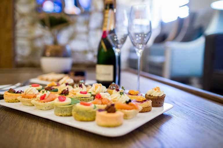 Champagne and canapes served in the AXIS Advantage Lounge